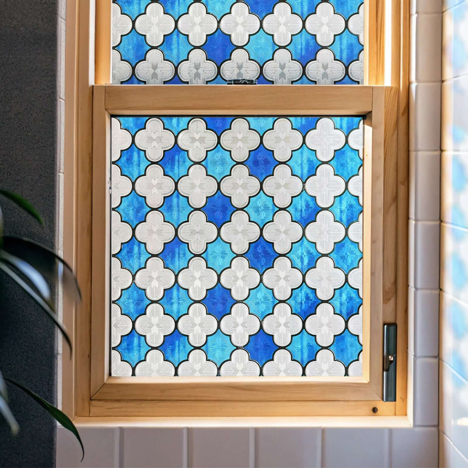 Clover Glow stained glass window film on a clean glass pane