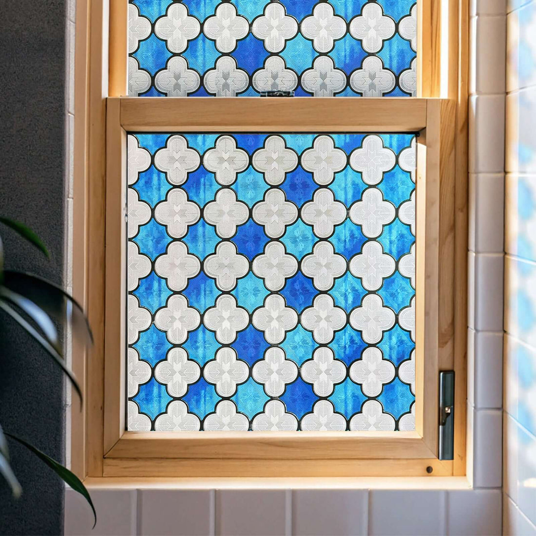 Clover Glow stained glass window film on a clean glass pane