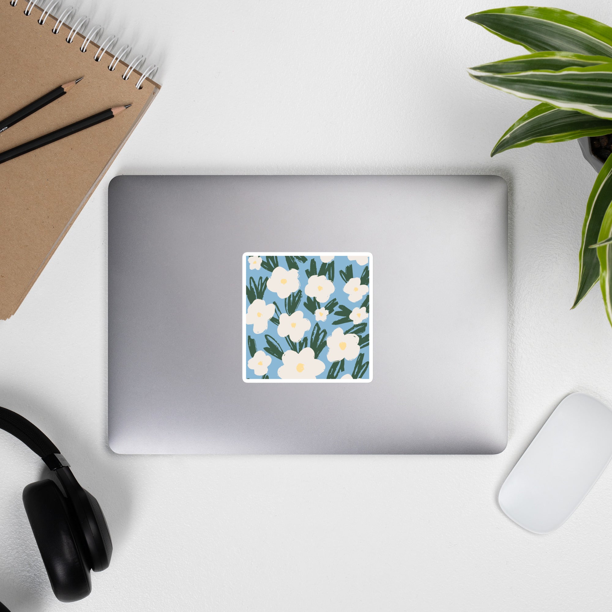Artistic Blue Sticker with White Flowers – Hand-Drawn Floral Decal for Crafts on laptop