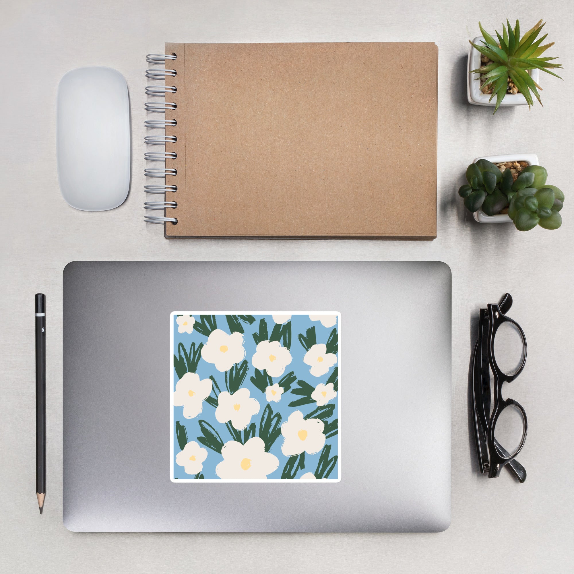 Artistic Blue Sticker with White Flowers – Hand-Drawn Floral Decal for Crafts on laptop