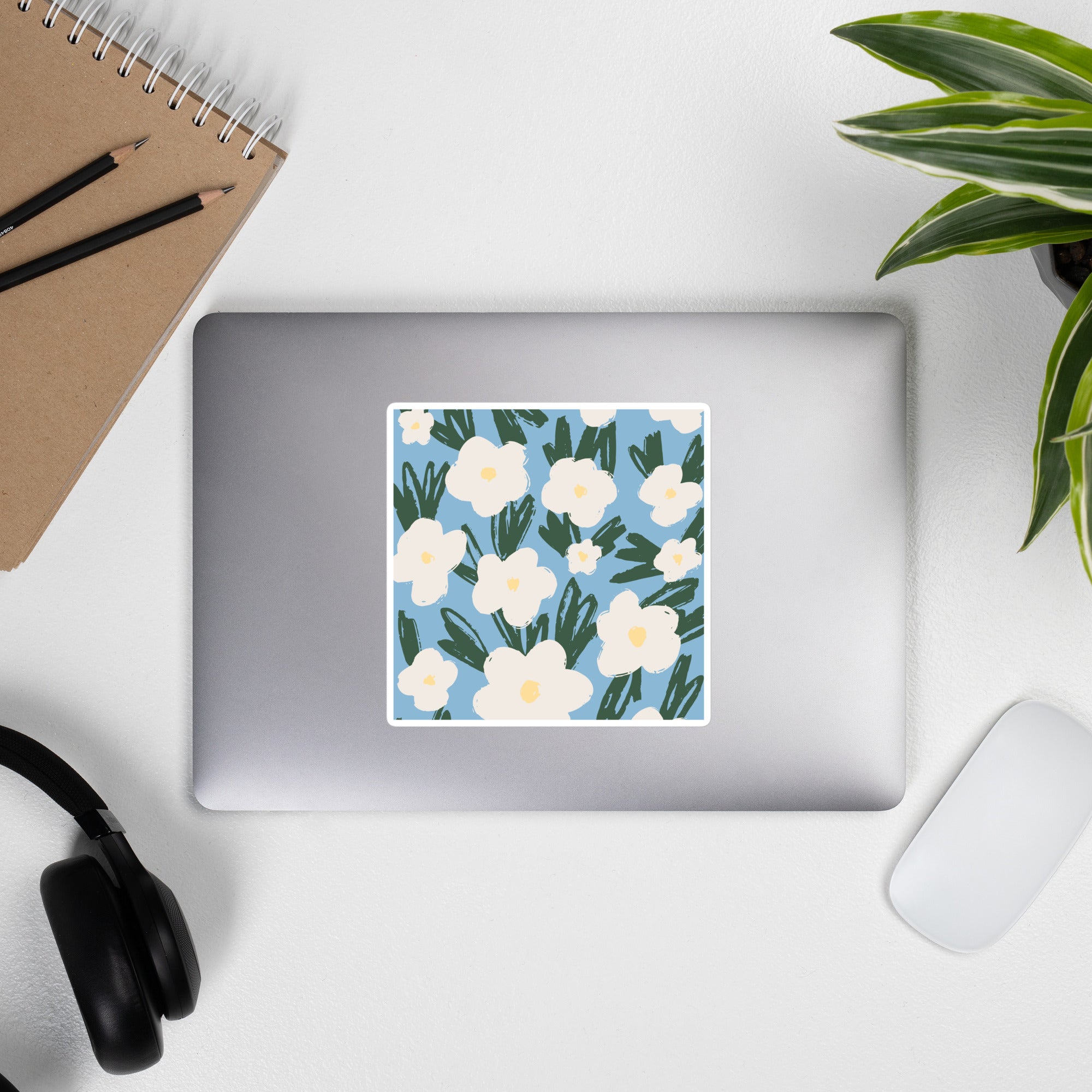 Artistic Blue Sticker with White Flowers – Hand-Drawn Floral Decal for Crafts on laptop