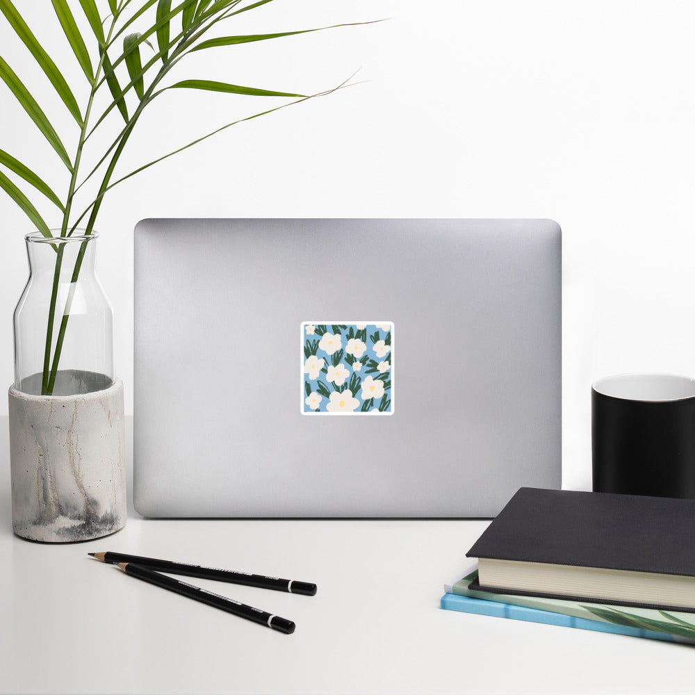 Artistic Blue Sticker with White Flowers – Hand-Drawn Floral Decal for Crafts on laptop