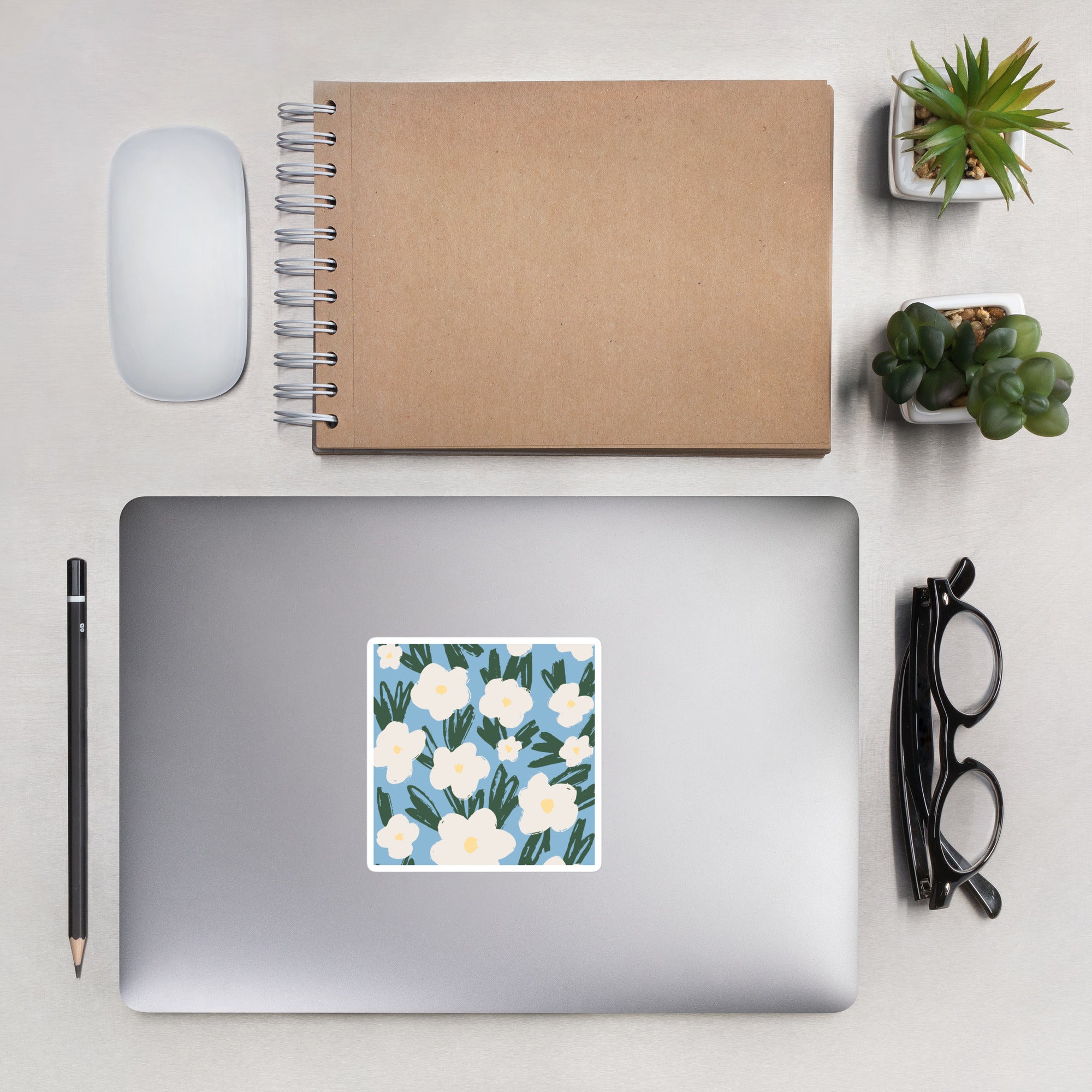 Artistic Blue Sticker with White Flowers – Hand-Drawn Floral Decal for Crafts on laptop