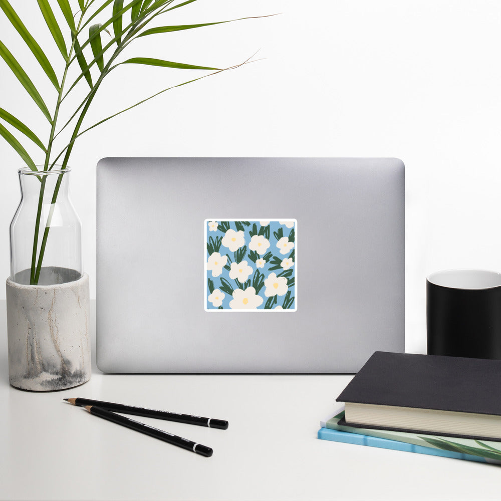Artistic Blue Sticker with White Flowers – Hand-Drawn Floral Decal for Crafts on laptop